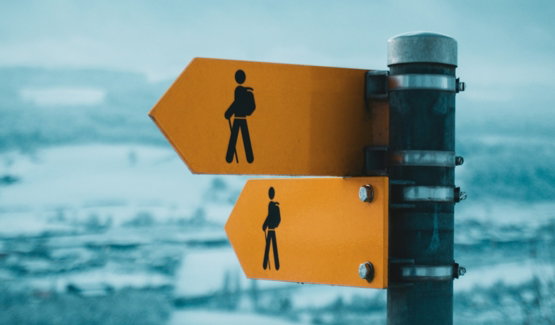 yellow and black arrow sign